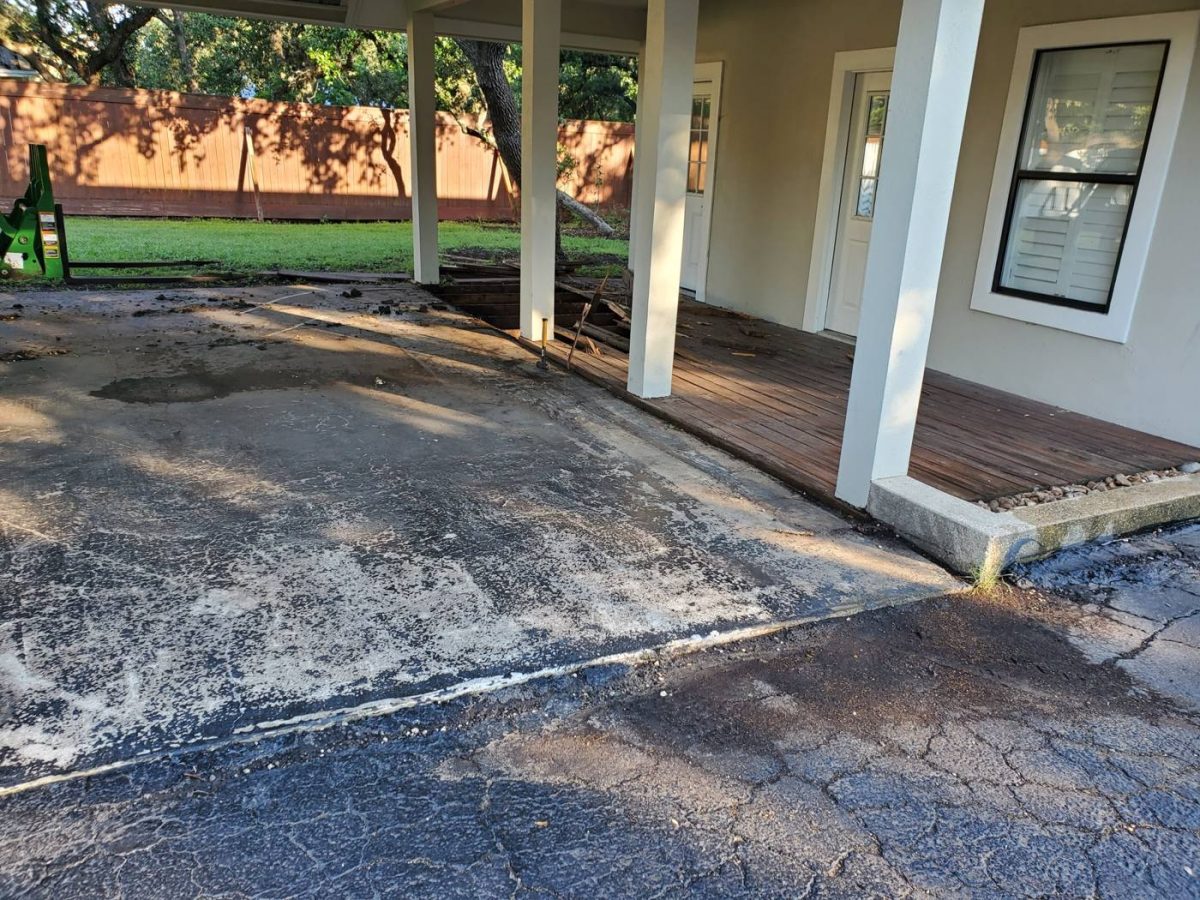 Helotes: Fixing a Flooding Porch with Drainage and Wood-Grain Stamped Concrete