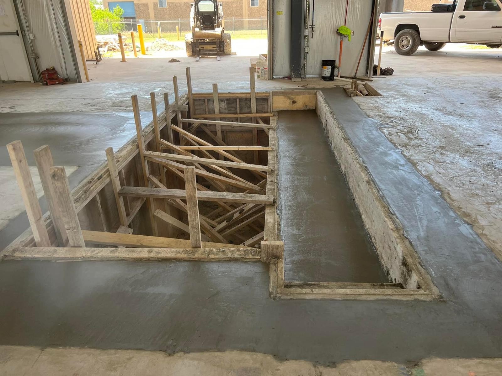 Formed equipment pit in a Tesla warehouse slab
